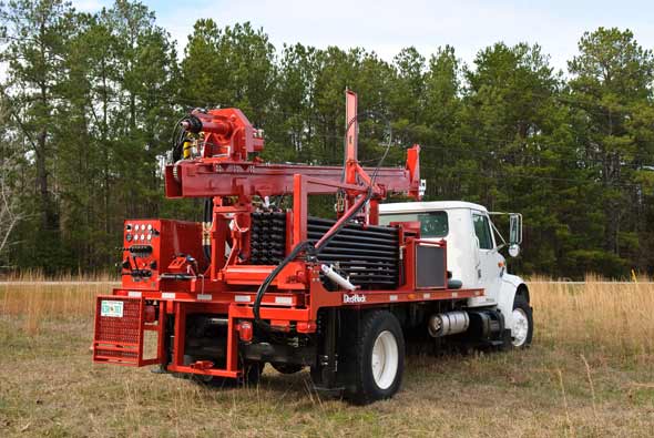 A DR150 Water Well Drilling Rig with a full load of drill rods ready for work